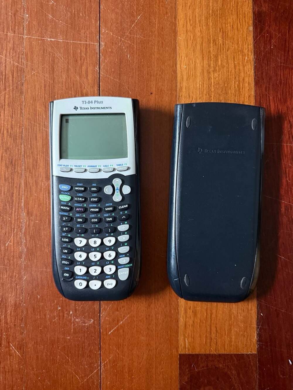 Texas Instruments TI-84 Plus Graphing Calculator with Slide Cover and USB Cable